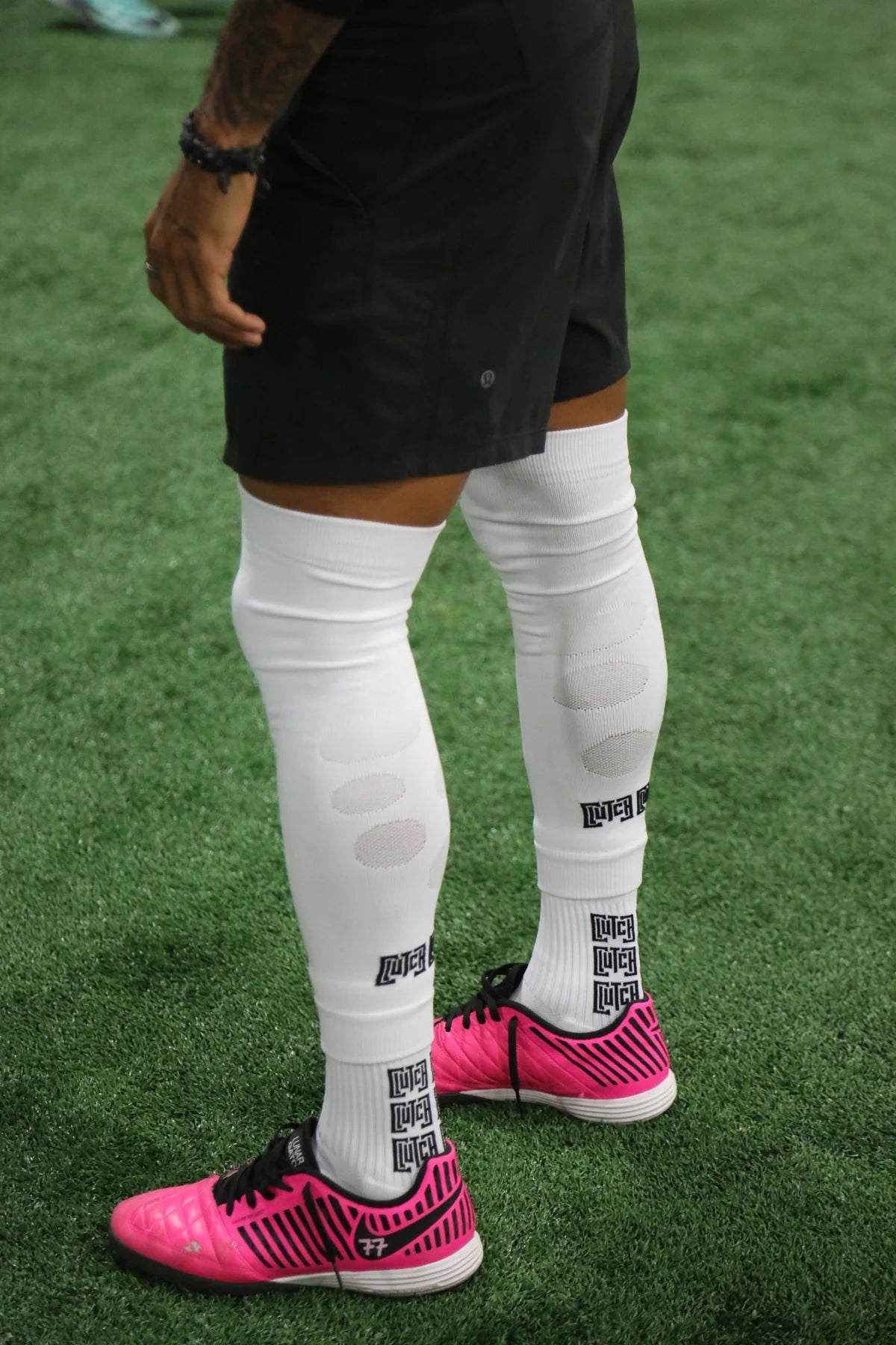 Original Clutch shoot: white Flex Flow sleeves paired with Clutch grip socks